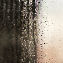 Image showing Glass, water or raindrops with steam on surface, texture and wallpaper or screensaver with abstract. Moisture, humid or liquid bubble on window, condensation and droplet with fog or reflection