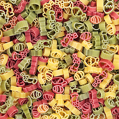 Image showing Tricolor Dried Pasta with Easter Shape Symbols 