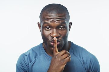 Image showing Black man, portrait and fitness with secret for workout, routine or privacy on a white studio background. Face of African or male person with silence or whisper for training or exercise on mockup