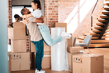 Image showing Moving, cardboard boxes and couple hug in new home for property investment, real estate or renting. Homeowner, happy man and woman embrace for mortgage loan, relocation or packages in apartment