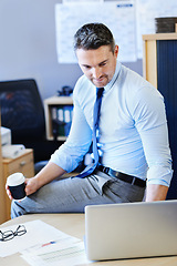 Image showing Businessman, laptop and coffee in office for work with technology. Male analyst and crypto at workplace for trade on computer, fintech analysis or financials with profits on market for company or job