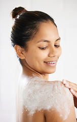 Image showing Body skincare, scrub and back of woman in studio with cosmetics, anti aging glow or hydration. Lotion application, sunscreen and shoulder of model with moisturiser, smile or cream on white background