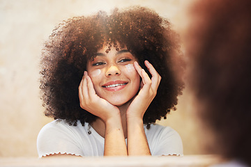 Image showing Beauty, face and lotion with black woman in mirror of bathroom for morning dermatology routine. Cream, skincare and smile with happy afro person in apartment to apply moisturizer cream for hydration