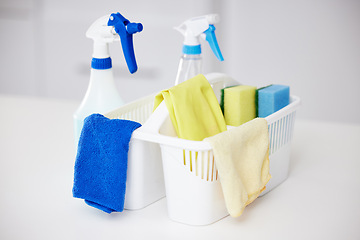 Image showing Cleaning, tools and basket with bottle spray for home disinfection or detergent container for janitor service. Chemical, cleaner or washing supplies with cloth and protection from bacteria or germs