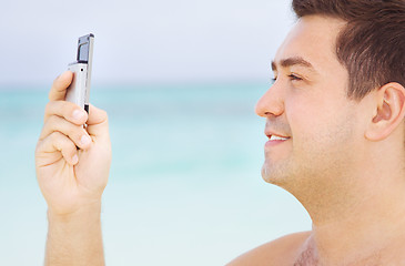 Image showing happy man with cell phone