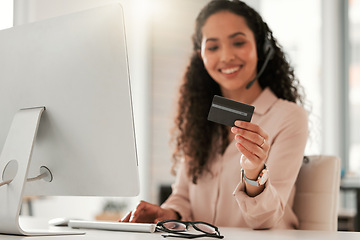 Image showing Office, african woman and credit card with computer for budget, online shopping and banking at work. Hands, female person and laptop for saving, investment and finance with fintech or ecommerce