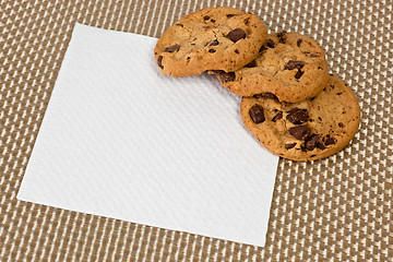 Image showing Chocolated chip cookies on a napkin