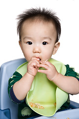 Image showing Baby feeding time