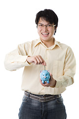 Image showing Asian businessman saving money