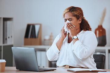 Image showing Woman, sick and blowing nose in office with tissue for sneeze, allergies or sinusitis with laptop. Person, employee and toilet paper to stop bacteria, health and cleaning face with flu in workplace