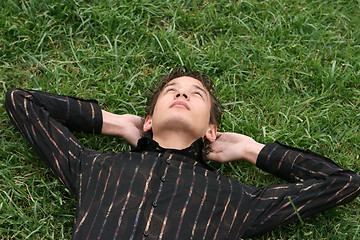 Image showing relaxing on grass