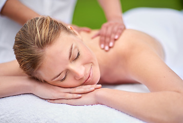 Image showing Massage, woman and spa for health, wellness and relaxation in muscles, back and neck for self care. Female person, physical therapy and detox for body with smile, calm and happiness on holiday