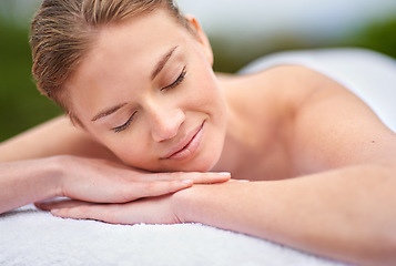 Image showing Massage, woman and spa for detox, wellness and relaxation in muscles, back and neck for self care. Female person, physical therapy and health for body with smile, calm and happiness on holiday