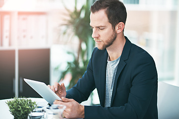 Image showing Businessman, research and browsing data with tablet for corporate growth, news or trends at office. Man or employee scrolling on technology for online investment, stock market or trading at workplace