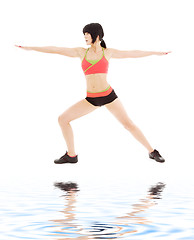 Image showing woman practicing virabhadrasana warrior pose