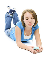 Image showing Teenage girl listening to music