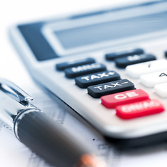 Image showing Tax calculator and pen