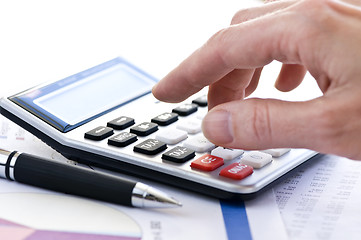 Image showing Tax calculator and pen