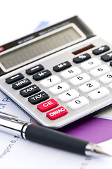 Image showing Tax calculator and pen