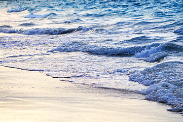 Image showing Waves breaking on tropical shore