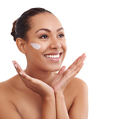 Image showing Happy woman, skincare and moisturizing with cream in beauty on a white studio background. Face of female person, brunette or model with smile in satisfaction for anti aging lotion, SPF or dermatology