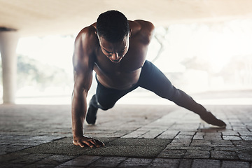 Image showing African man, push up and strong in city with fitness for balance, shirtless or muscle for power on ground. Person, bodybuilder and outdoor on concrete for wellness, training and exercise in New York