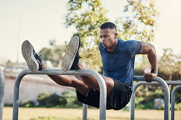 Image showing Black man, dips and exercise outdoor in park or calisthenics workout for arm strength, wellness or gym. Male person, training and core fitness as muscle challenge with sports, equipment or athlete