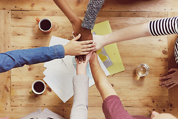 Image showing Hands, above and teamwork with business people in circle for collaboration, community support and diversity. Group, employees or colleagues in huddle for connection, partnership and solidarity