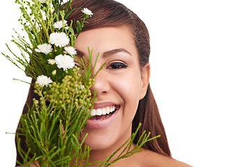 Image showing Skincare, flowers and woman with plants in beauty, dermatology or mockup in white background. Studio, face and portrait of girl with natural floral cosmetics and sustainable makeup or product