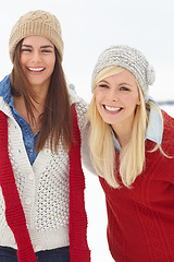 Image showing Portrait, lesbian couple and snow in winter on holiday is Alaska for Christmas, festive and travel for bonding. Cheerful, women and laugh with happiness, fun and love for vacation, break or retreat