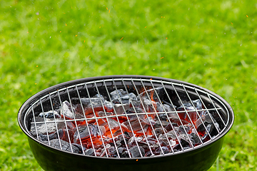 Image showing burning charcoal grill