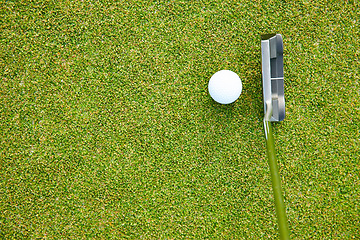 Image showing Golf ball, club and grass for sports, play and hobby for recreation in summer outdoor. Equipment, metal and mockup on field for training, nobody and activity on green turf for practice and game