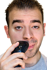 Image showing Young Man Shaving