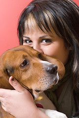 Image showing Girl Kisses Her Dog