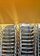 Image showing pile of metallics chairs
