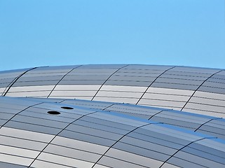 Image showing Closeup of a glass building under clear sky