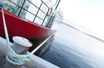 Image showing Red ship moored at a quay