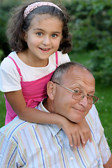 Image showing Happy grandfather and kid outdoors