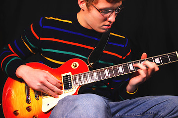 Image showing Young Man Playing Electric Guitar