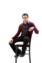 Image showing Handsome guy sitting on chair