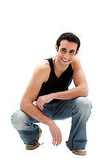 Image showing Handsome guy squatting