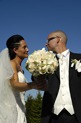 Image showing Wedding bouquet and wedding couple