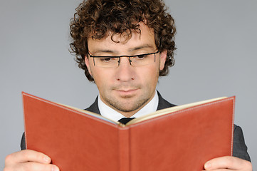 Image showing Businessman reading book