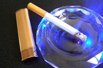 Image showing cigarette and lighter