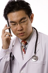 Image showing Asian Doctor With Mobile Phone