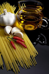 Image showing pasta garlic extra virgin olive oil and red chili pepper