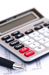 Image showing Tax calculator and pen