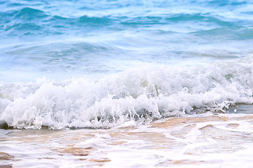 Image showing Waves breaking on tropical shore