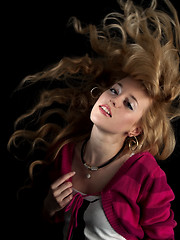 Image showing Teen beauty shaking hair