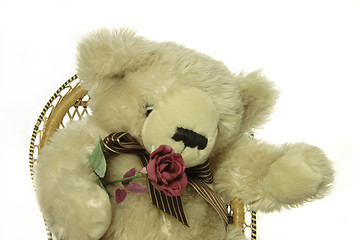 Image showing teddy bear with a red rose